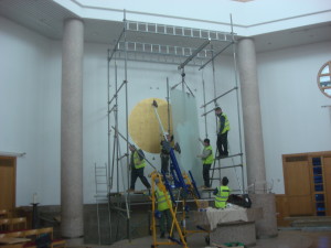 The right-hand panel is carefully swung into position